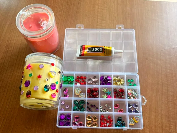 Bedazzle Candle Kit with a decorated candle and bead box
