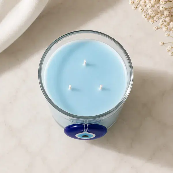 Top view of the pale blue three-wick candle